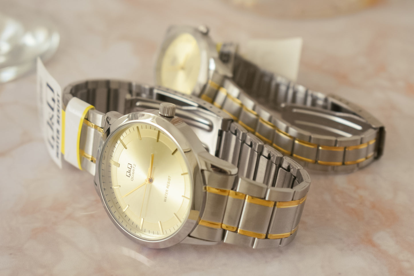 Reloj Q&Q Pareja Bicolor